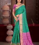 emerald green patola silk blend woven work traditional saree