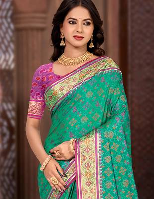 emerald green patola silk blend woven work traditional saree 2