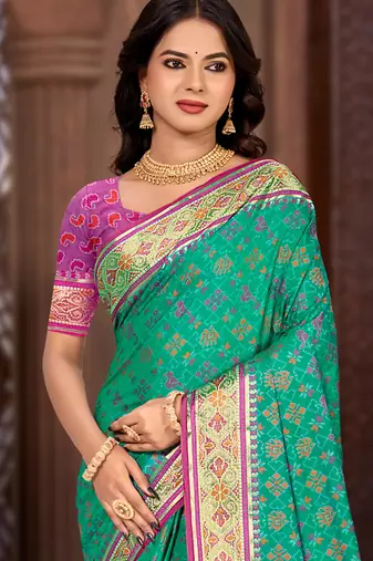 emerald green patola silk blend woven work traditional saree