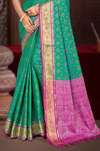 emerald green patola silk blend woven work traditional saree