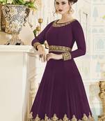 Georgette salwar kameez in purple color with embroidery and crystal stone work