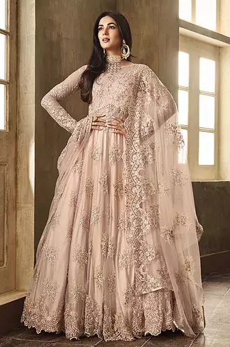 Soft net anarkali party wear salwar kameez in peach color with embroidery and crystal stone work