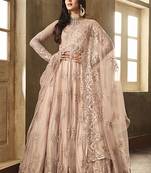Soft net anarkali party wear salwar kameez in peach color with embroidery and crystal stone work