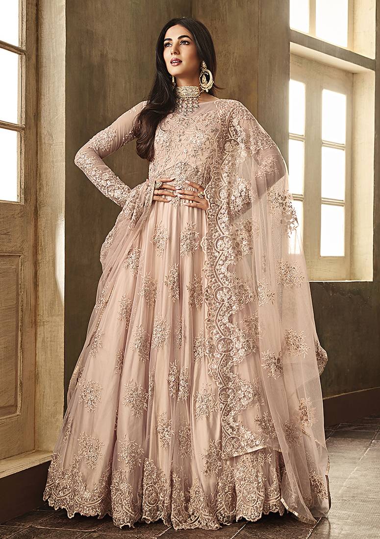 Soft net anarkali party wear salwar kameez in peach color with embroidery and crystal stone work