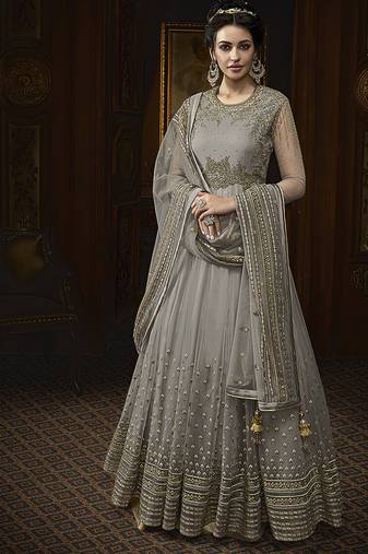Soft net anarkali party wear salwar kameez in grey color with embroidery and crystal stone work