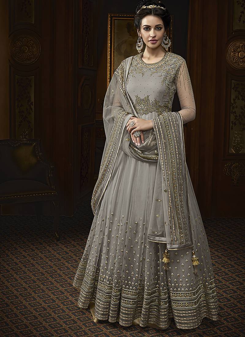 Soft net anarkali party wear salwar kameez in grey color with embroidery and crystal stone work