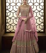 Soft premium net anarkali party wear salwar kameez in pink color with embroidery and crystal stone work