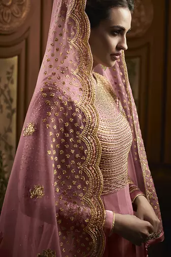 Soft premium net anarkali party wear salwar kameez in pink color with embroidery and crystal stone work