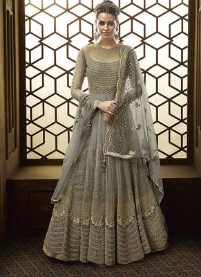 Soft net anarkali party wear salwar kameez in grey color with embroidery and crystal stone work 1