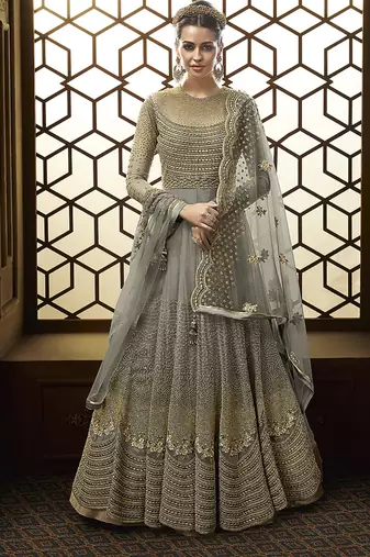 Soft net anarkali party wear salwar kameez in grey color with embroidery and crystal stone work