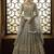 Soft net anarkali party wear salwar kameez in grey color with embroidery and crystal stone work