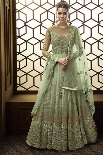 Soft net anarkali party wear salwar kameez in green color with embroidery and crystal stone work
