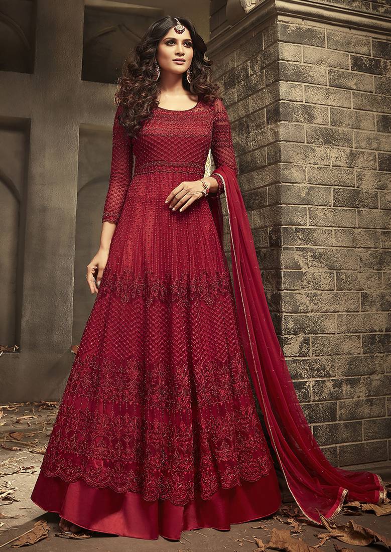 Soft net anarkali wedding salwar kameez in red color with embroidery and crystal stone work