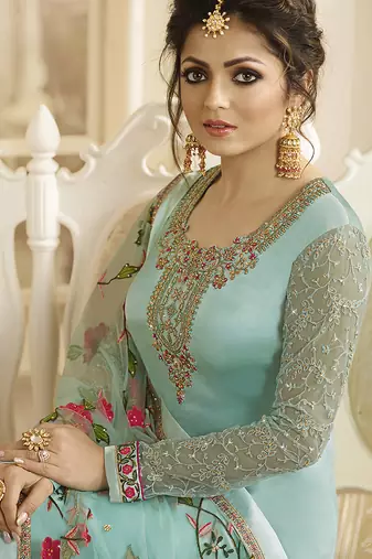 Satin georgette salwar kameez in sky blue color with embroidery and crystal stone work