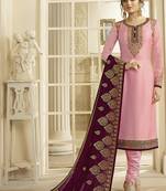 Satin georgette salwar kameez in pink color with embroidery and crystal stone work
