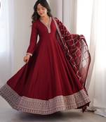 Women’s traditional maroon floor-length anarkali with heavy border