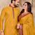 Mustard yellow silk couple set with matching kurta and saree