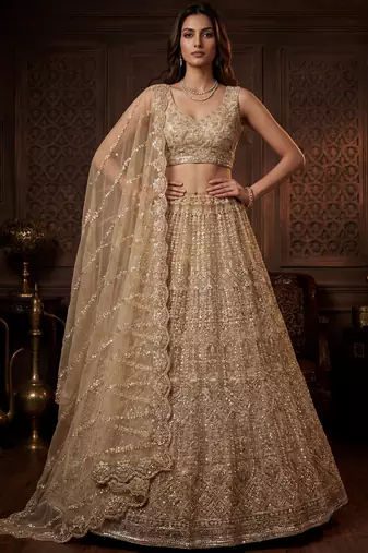 Graceful Golden Hand Work Net Designer Lehenga Choli With Dupatta