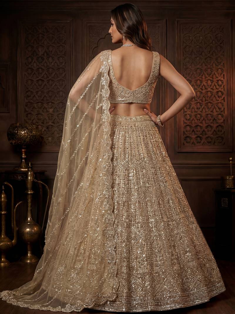 Graceful Golden Hand Work Net Designer Lehenga Choli With Dupatta