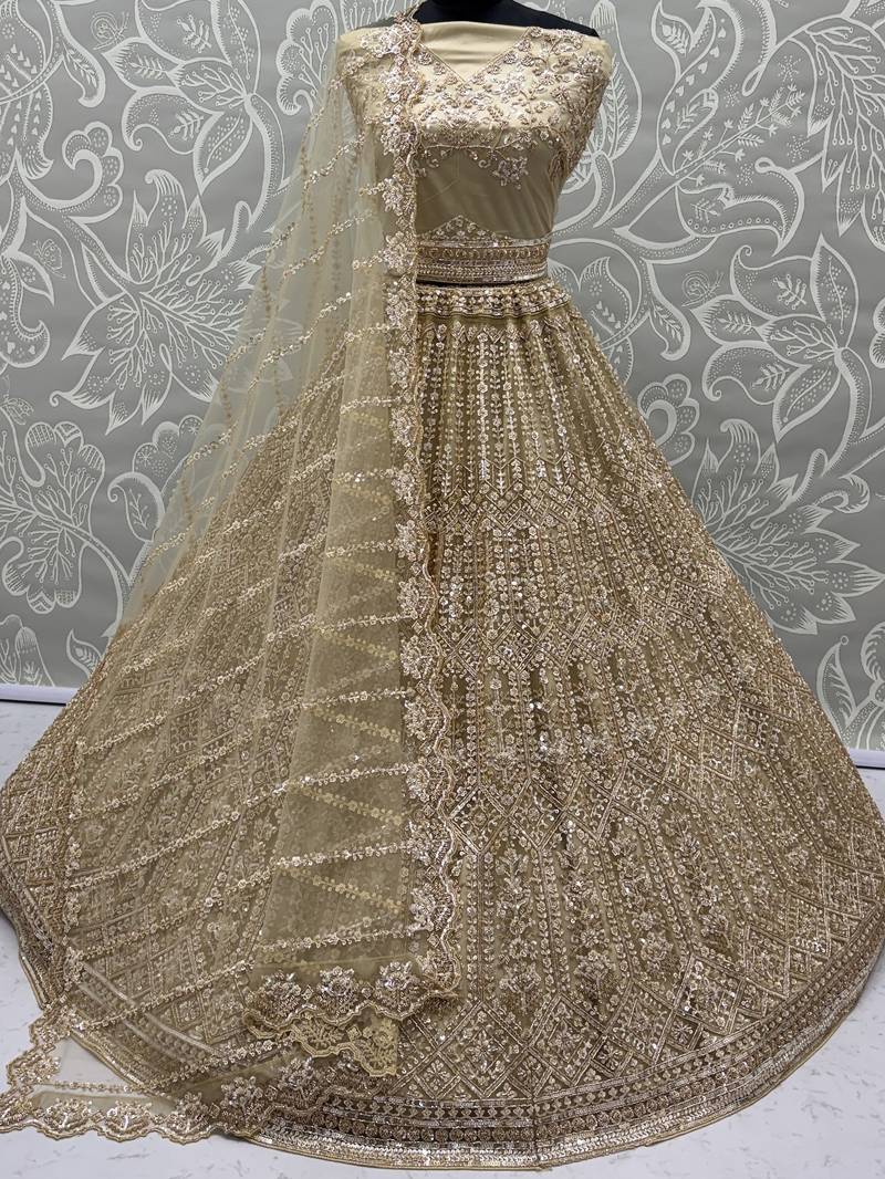 Graceful Golden Hand Work Net Designer Lehenga Choli With Dupatta