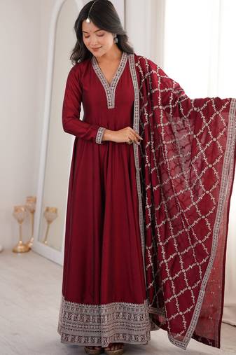 maroon silk gown with embroidered detailing