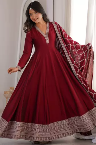 maroon silk gown with embroidered detailing