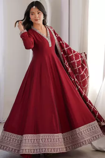 maroon silk gown with embroidered detailing