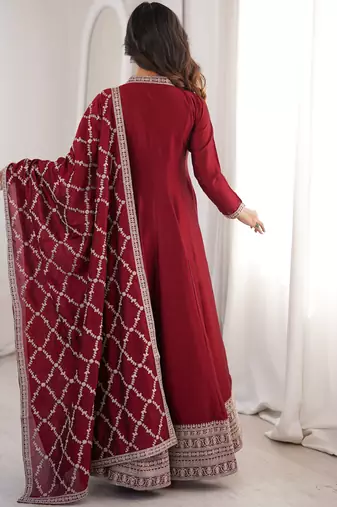 maroon silk gown with embroidered detailing