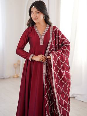 maroon silk gown with embroidered detailing 6