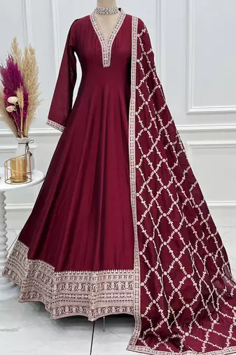 maroon silk gown with embroidered detailing