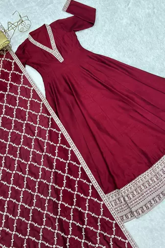 maroon silk gown with embroidered detailing