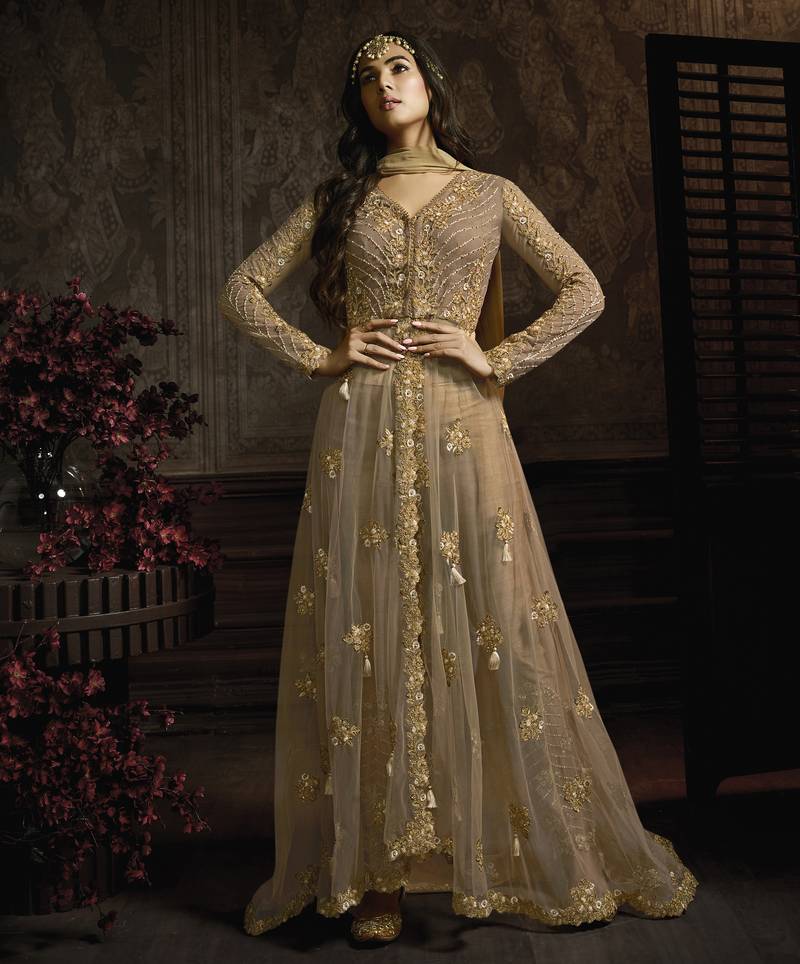 designer golden net gown with sequins and crystal detailing