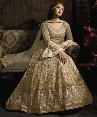 golden net wedding gown with embroidery, sequins, and crystal work 1
