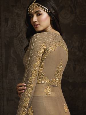 designer golden net gown with sequins and crystal detailing 4