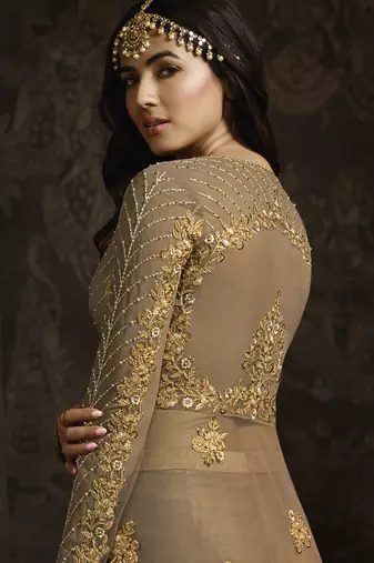 designer golden net gown with sequins and crystal detailing