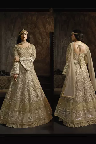 golden net wedding gown with embroidery, sequins, and crystal work
