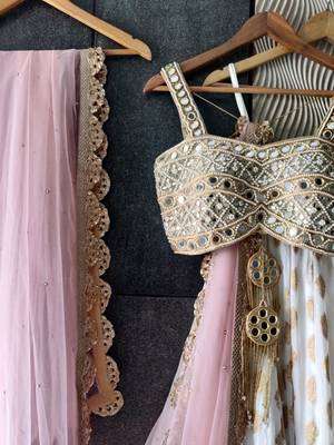 white banarasi georgette lehenga choli with gold motifs 3