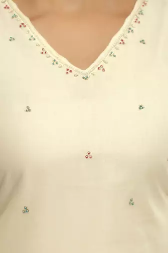 white cotton kurta pant set with floral embroidery and dupatta