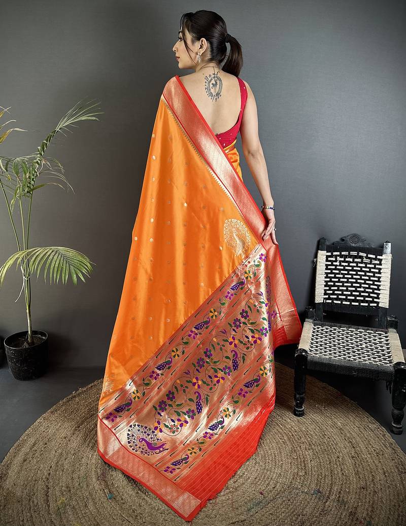 orange lichi silk blend paithani peacock motifs zari work saree