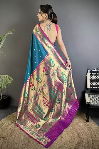 teal blue lichi silk blend ikkat floral motifs zari woven paithani saree