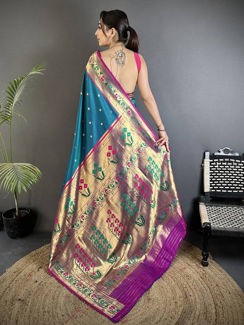 teal blue lichi silk blend ikkat floral motifs zari woven paithani saree