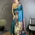 teal lichi silk blend floral & meena weaving zari worked paithani saree