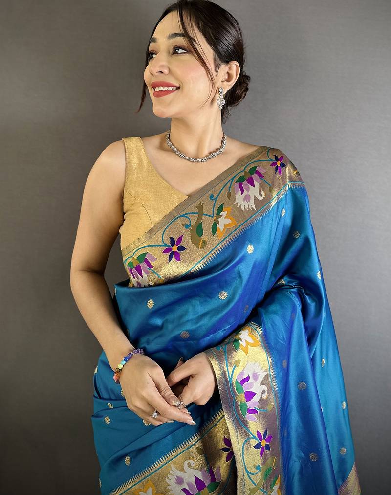 teal blue lichi silk blend floral & meena weaving zari worked paithani saree