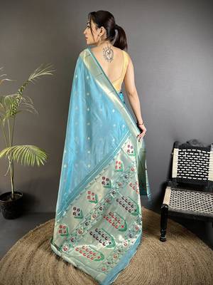 sky blue lichi silk blend floral ikkat motifs zari weaving paithani saree 3