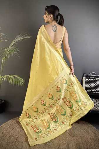 light yellow lichi silk blend floral ikkat motifs zari weaving paithani saree