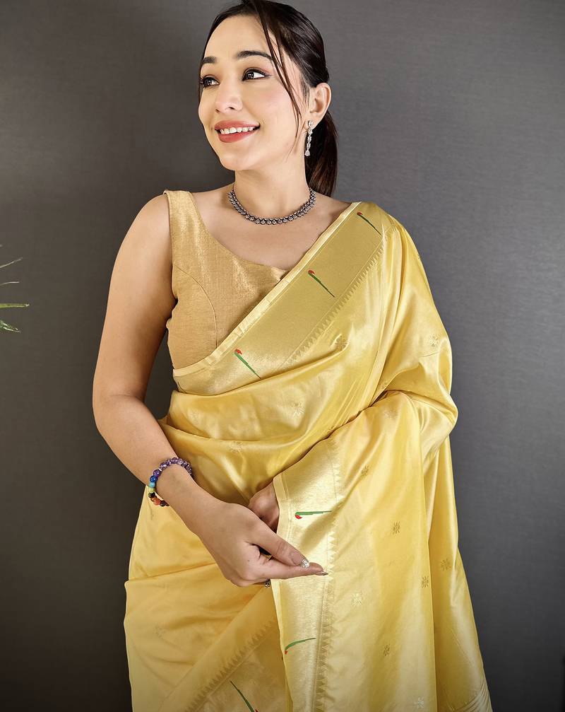 light yellow lichi silk blend floral ikkat motifs zari weaving paithani saree