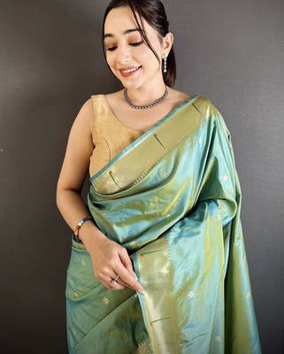 light green lichi silk blend floral ikkat motifs zari weaving paithani saree 4