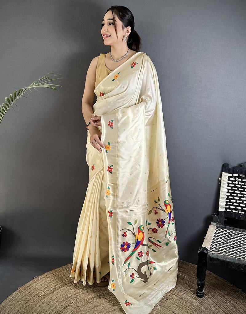 off-white lichi silk blend parrot & floral woven design zari weaving paithani saree