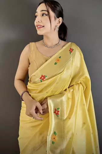light yellow lichi silk blend parrot & floral woven design zari weaving paithani saree