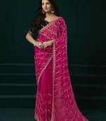Rani pink net jaal pattern sequence embroidery thread work party wear saree